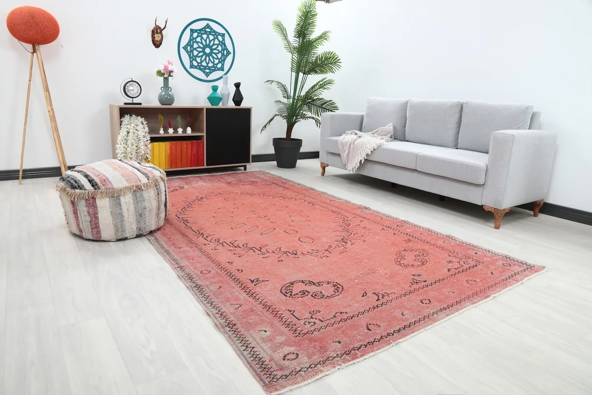 Angle view of the rose geometric medallion rug in a modern living space