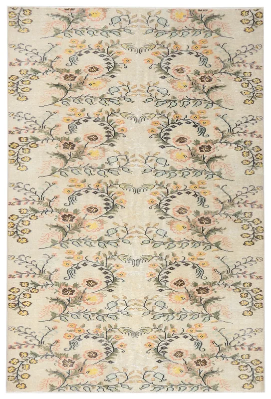 Full overhead view of the 5x8 vintage Anatolian rug with an ivory field and multicolor floral pattern