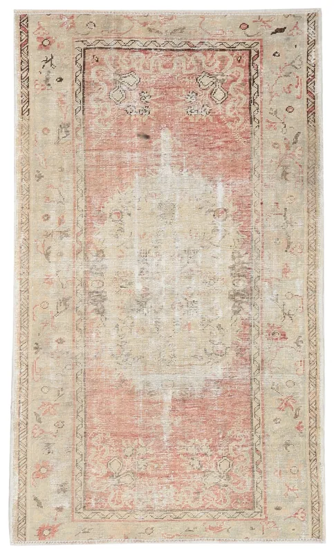 Full top view of the 3x6 vintage Anatolian rug with a faded rose field and beige border.