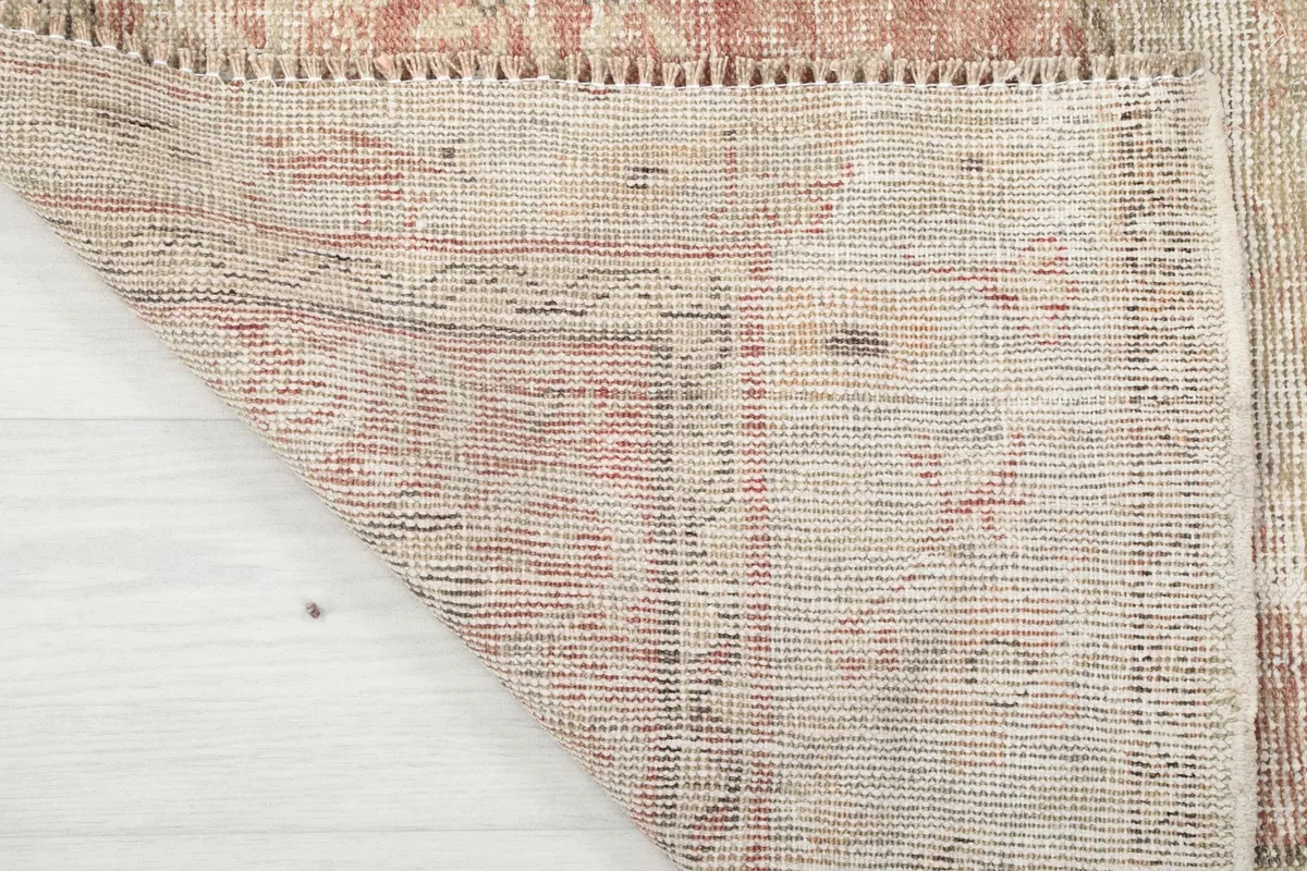 Close-up of the reverse side of the rug, showing the dense hand-knotting and foundation.