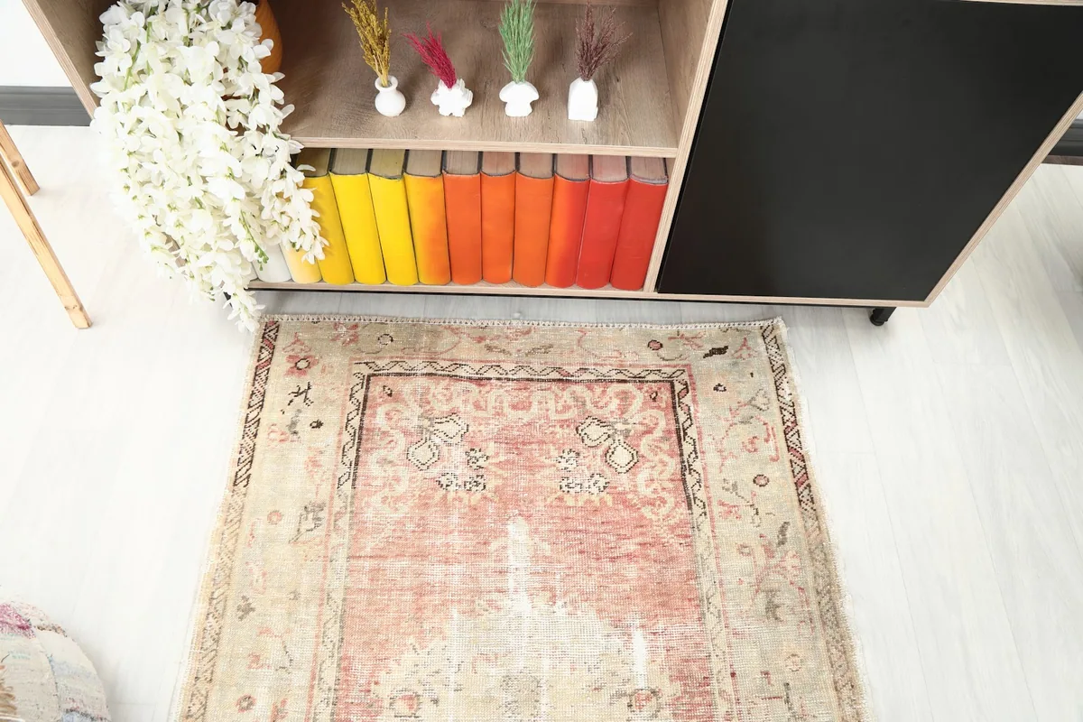 Direct overhead view of the rug's top half, showing the intricate patterns and color variations.