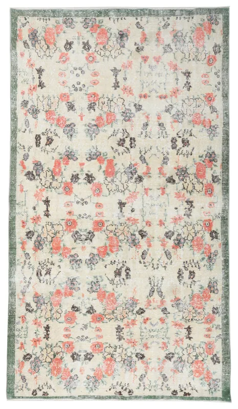 Full top view of the ivory, rose, and green floral vintage Anatolian area rug.
