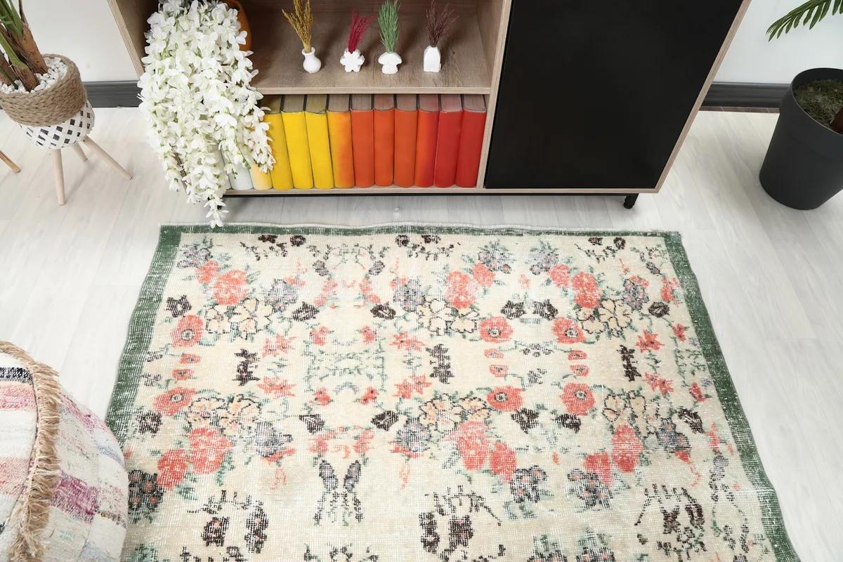 Overhead view of the rug highlighting its design and colors in a room setting.