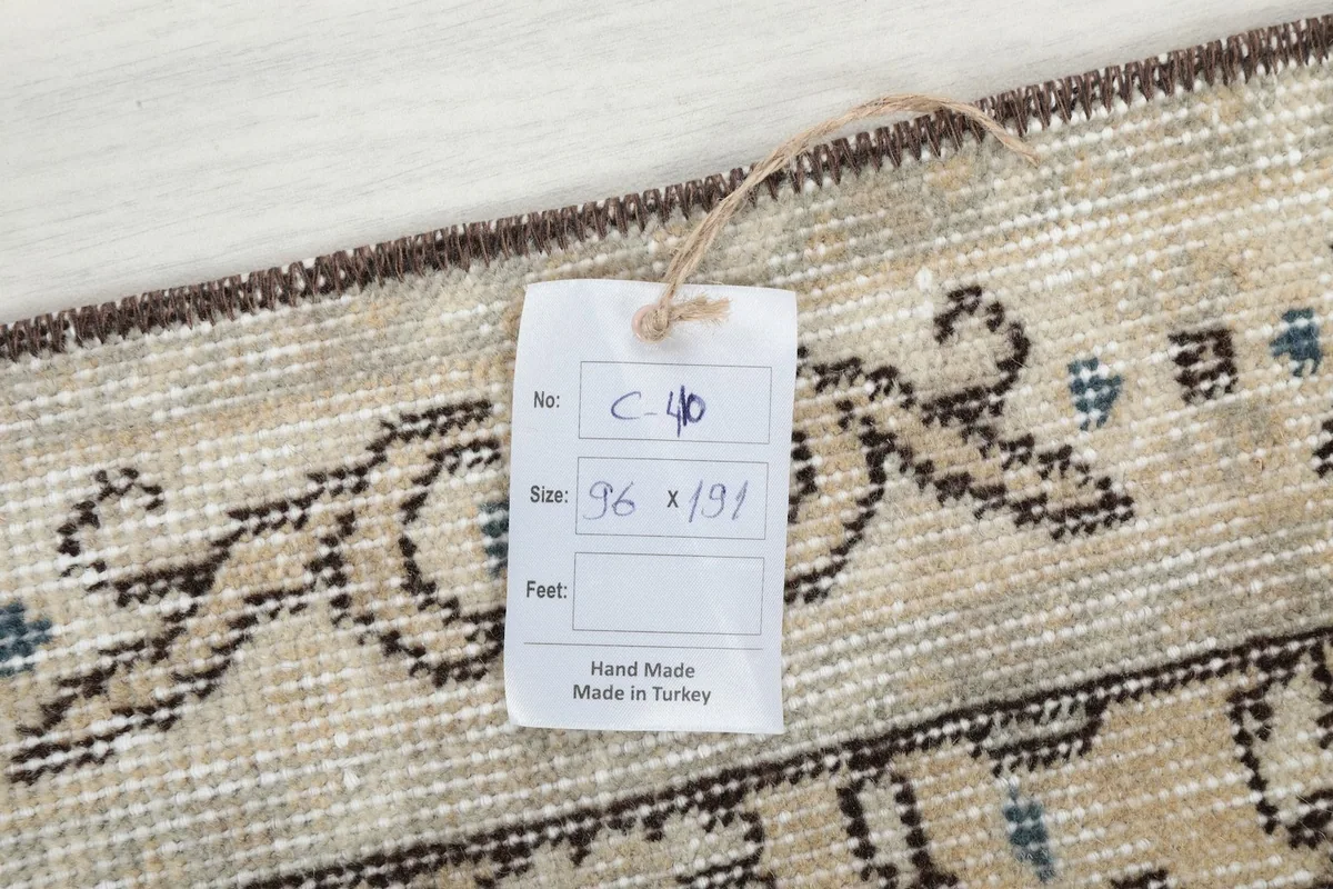 View of the product tag indicating size and 'Hand Made in Turkey'