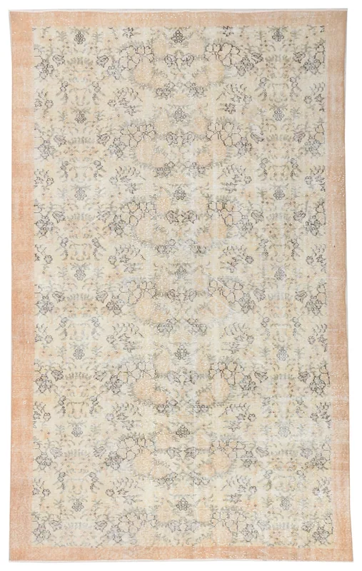 Full overhead view of the 5x9 vintage cream floral Anatolian rug