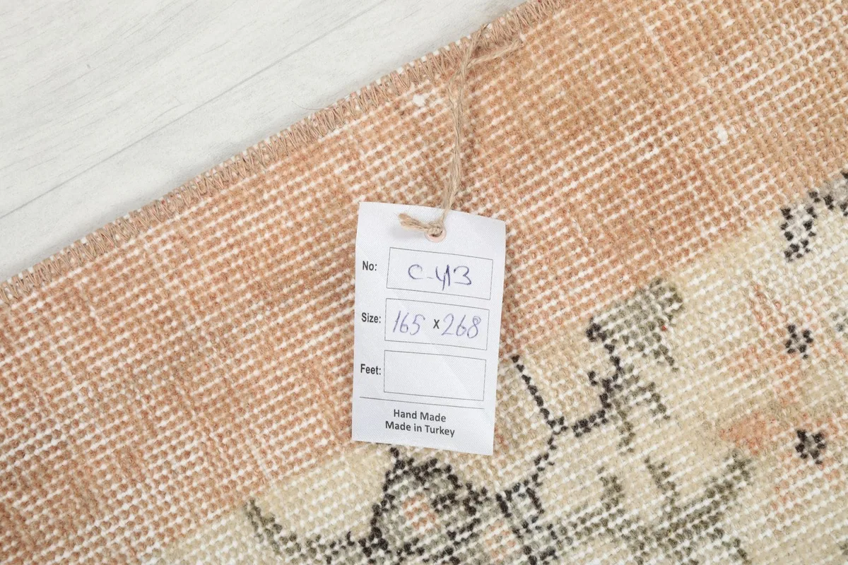 Product tag on the back of the rug, confirming size and origin