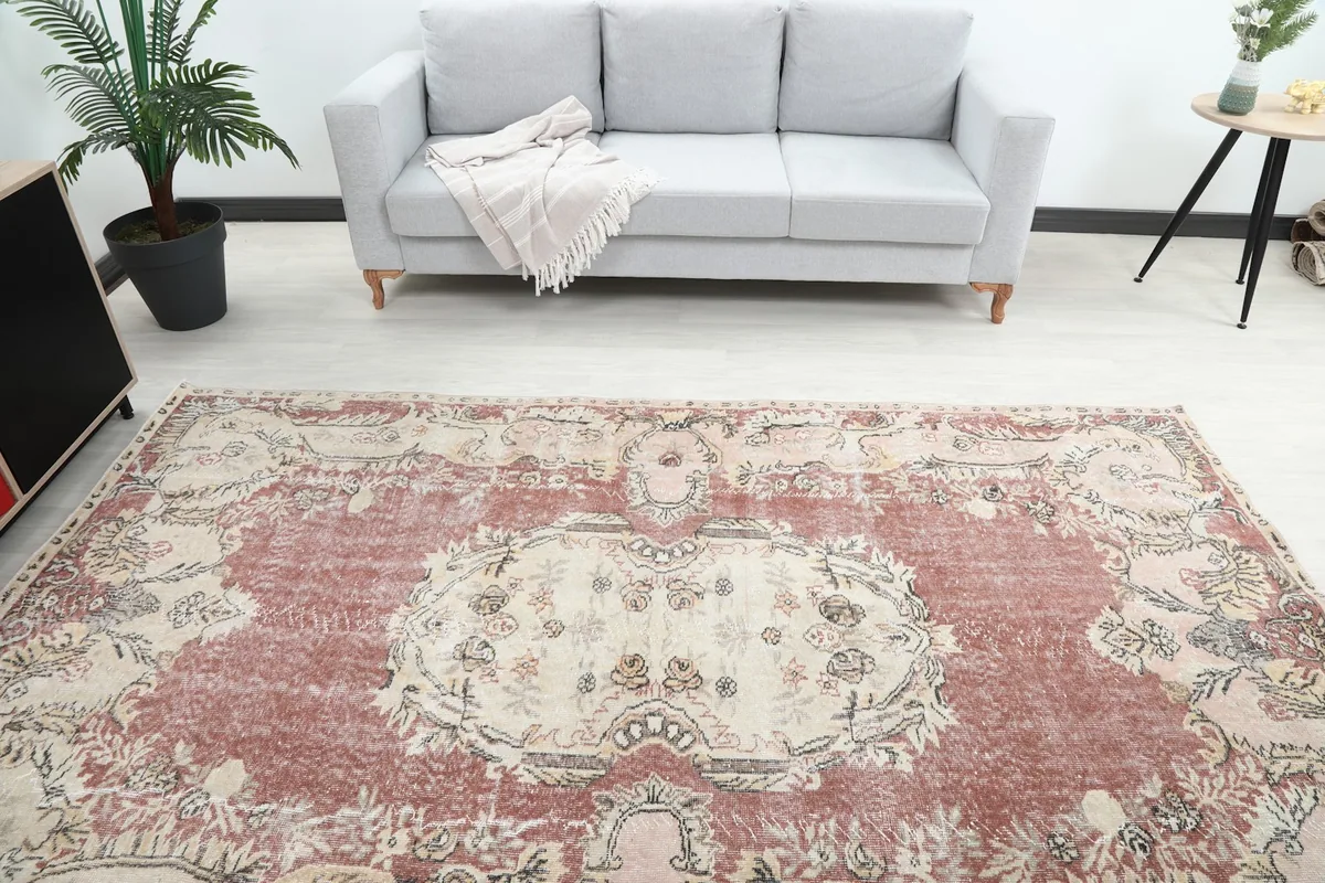Overhead view of the rug showcasing the full medallion and border design in a room setting.