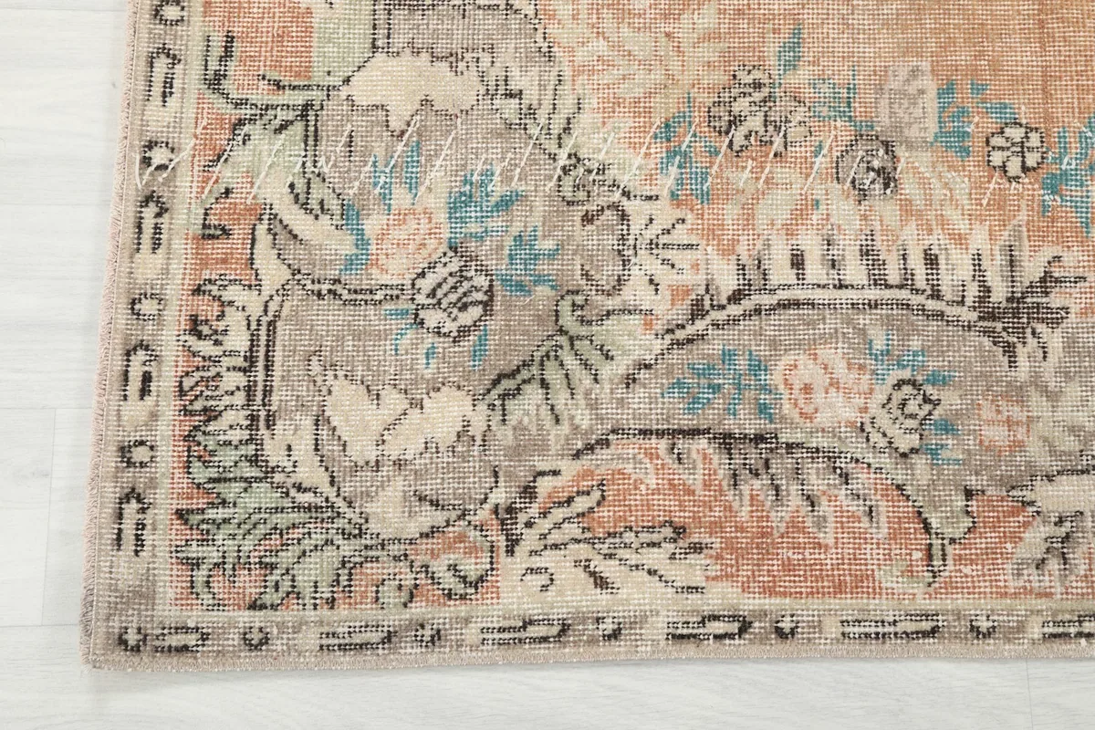 Close-up of the intricate border design and corner of the vintage Anatolian rug