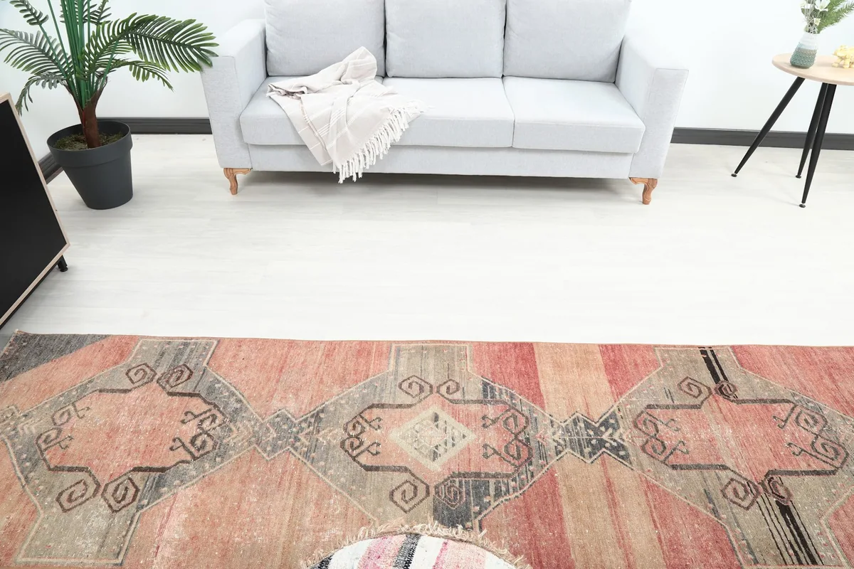 Overhead angled view of the middle section of the runner rug, capturing the repeating tribal design