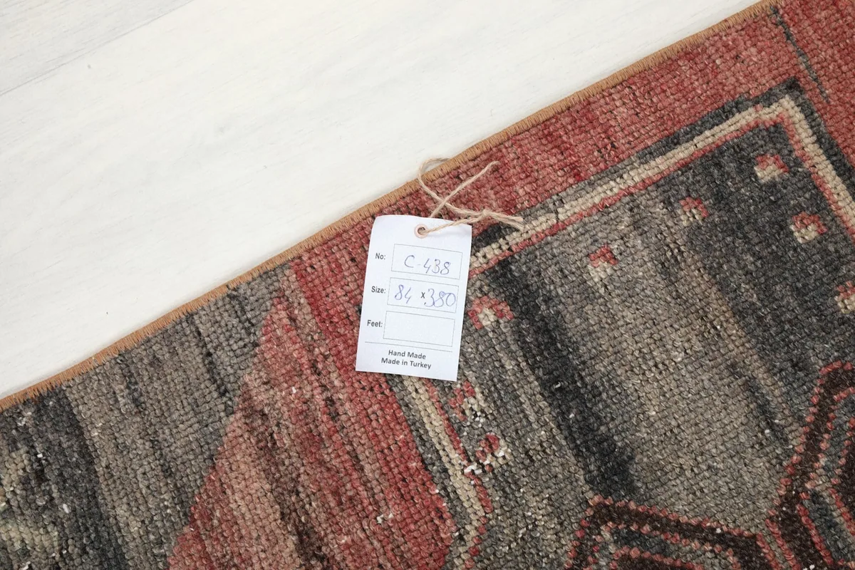 Close-up of the rug's label, indicating its origin from Anatolia, Turkey and dimensions