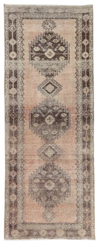 Full overhead view of the 4x11 vintage Anatolian runner with a rose field and tribal motifs