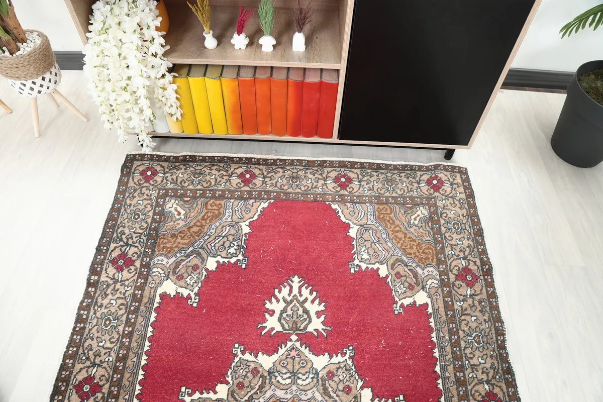 Angled view looking down the length of the rug, showing the top portion of the design