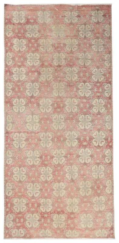 Full overhead view of the 5'0" x 10'9" rose, beige, and gray geometric vintage Anatolian area rug on a white background.