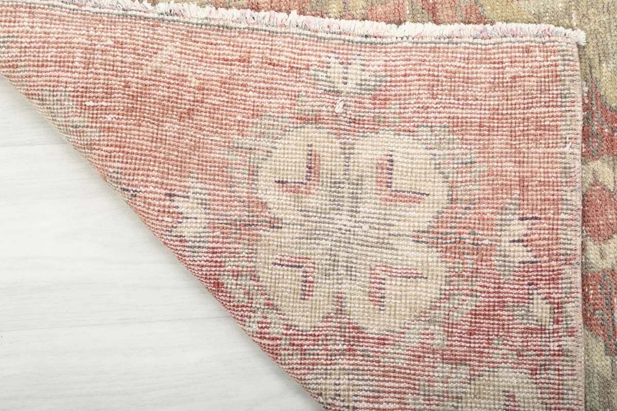 Close-up of the back of the vintage Anatolian rug, revealing the intricate hand-knotted wool pile on cotton foundation.