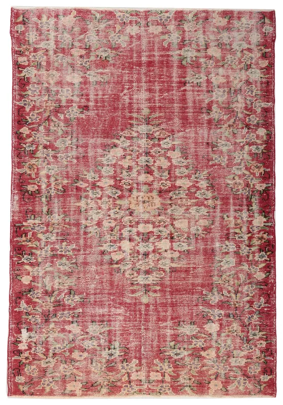 Full top view of the 5'5" x 7'10" red vintage Anatolian rug with floral and geometric patterns