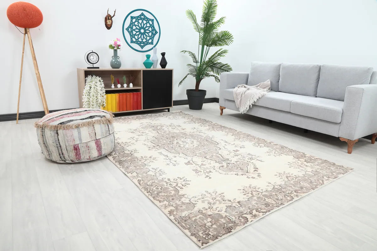 Ivory Gray Medallion Anatolian Rug in a modern living space, showing its placement relative to furniture.