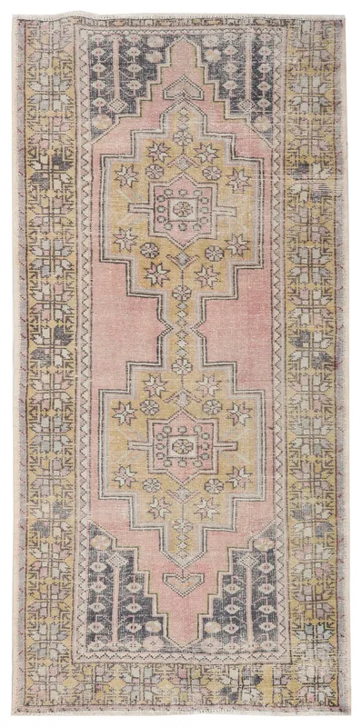 Pink Gold Geometric Anatolian Rug, full top view showing faded pink and gold geometric patterns with gray and black accents.