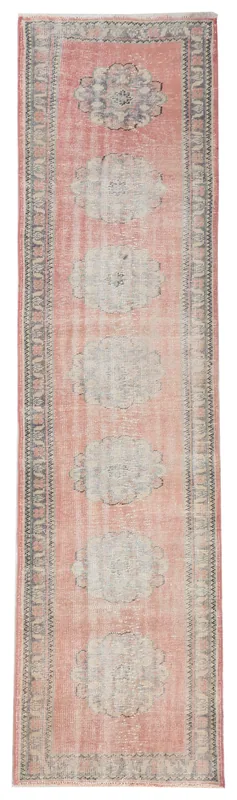Full top view of the 2'9" x 10'7" rose geometric vintage runner on a white background