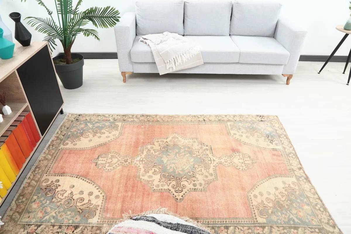 Overhead view of the rug in a living room, showing its placement relative to furniture