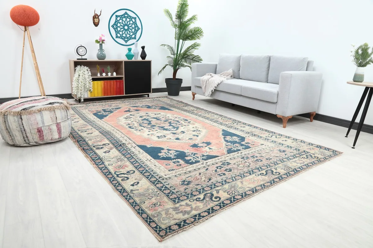 Angle view of the large Anatolian rug in a contemporary living space with a sofa