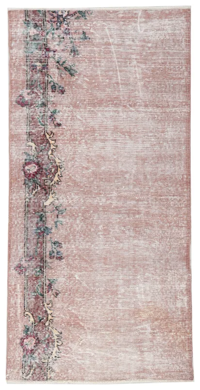 Full top view of the rose vintage hand-knotted wool rug with a vibrant floral border