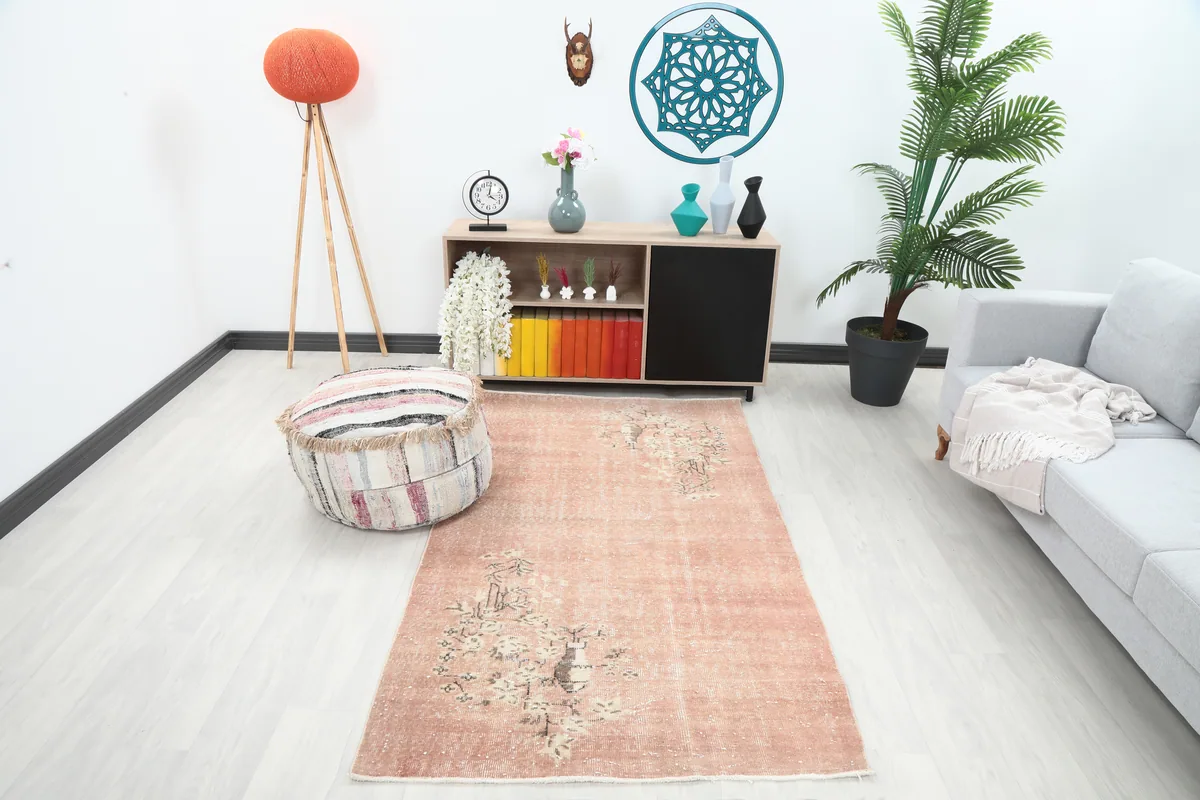 Faded Rose Floral Anatolian Rug in a modern living space, showing its size and color in context.