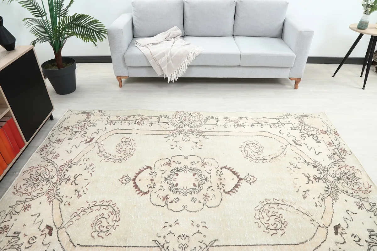 Overhead view of the rug in a room, highlighting the central medallion and overall pattern