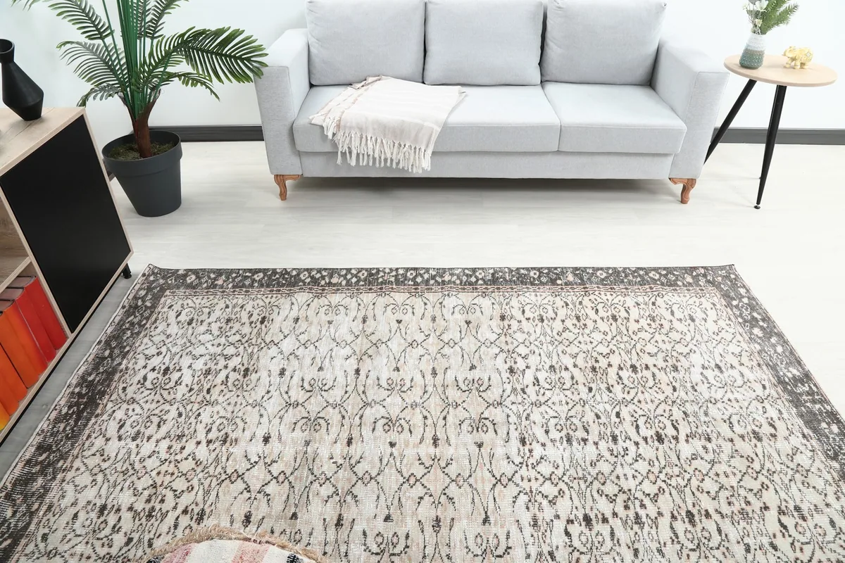 Overhead view from one end of the rug, showing the full design in a room.