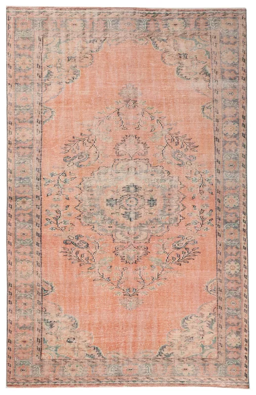 Full overhead view of the hand-knotted rose and gray Anatolian vintage area rug