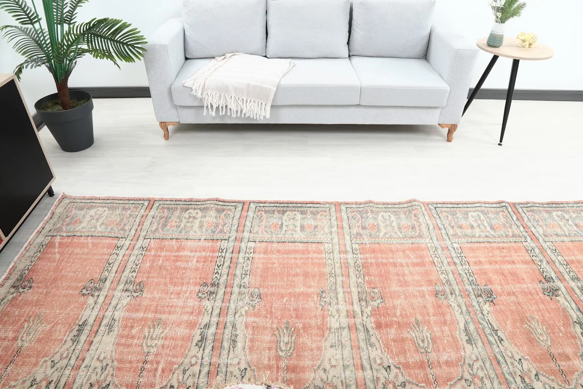 Overhead view of the rust runner in a room, showcasing its repeated panel design