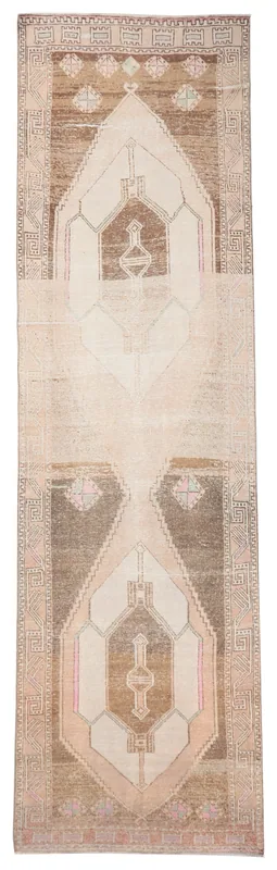 Full top view of the 3'8" x 13'1" vintage Anatolian runner rug with beige and brown tribal geometric patterns
