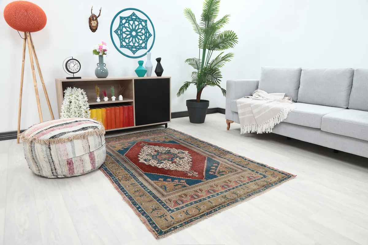 Angle view of the rug in a living room, showing its placement relative to furniture