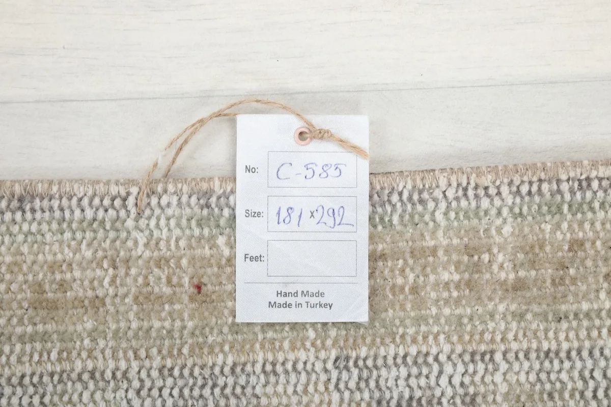 Product tag attached to the rug, displaying its unique item number and origin from Turkey