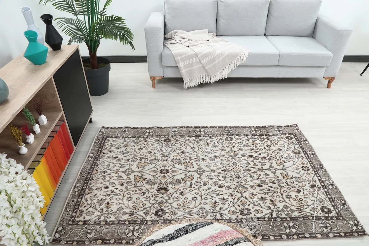Overhead view of the rug in a living room, highlighting its size relative to the sofa