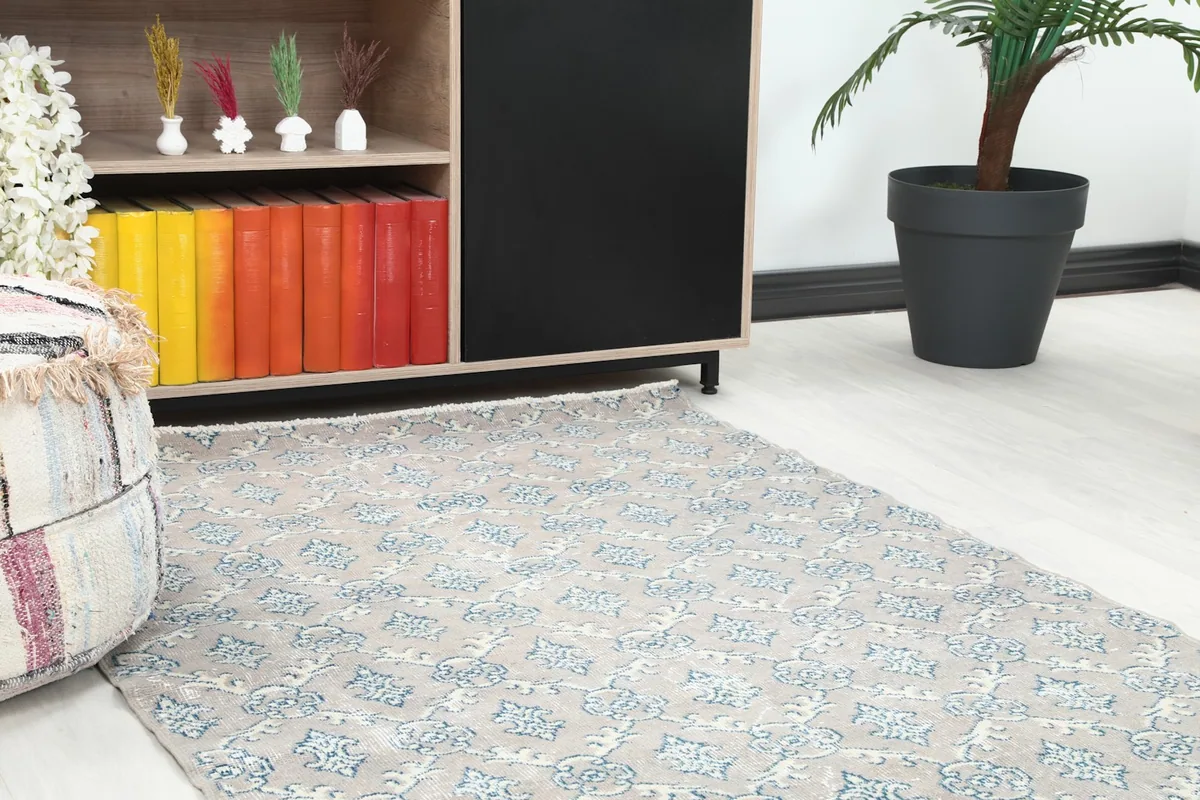 Close-up view of the rug's pattern and texture in a room setting
