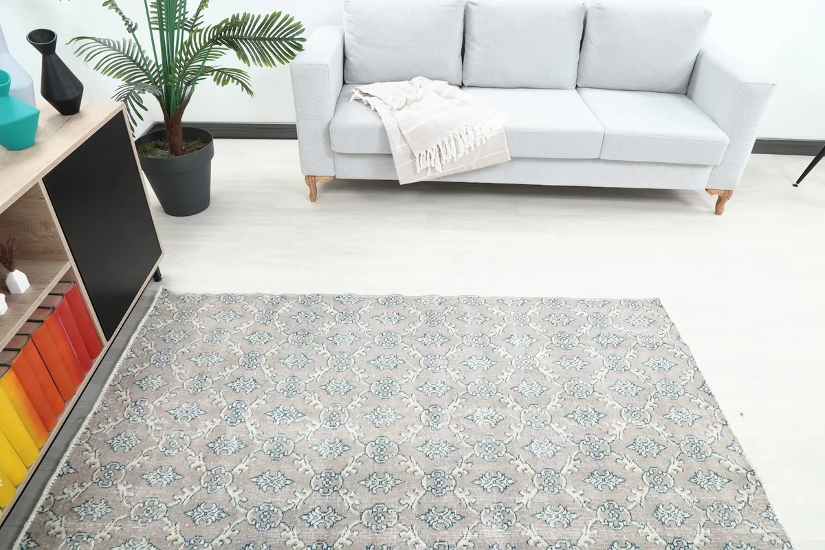 Overhead view of the rug showing its placement in front of a sofa