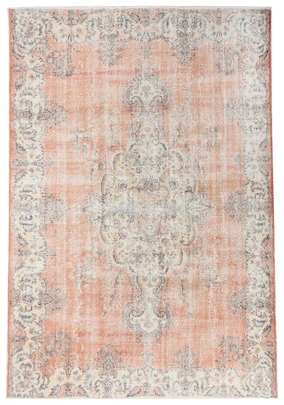 Full top view of the 7'4" x 10'4" rust and ivory vintage Anatolian area rug on a white background.