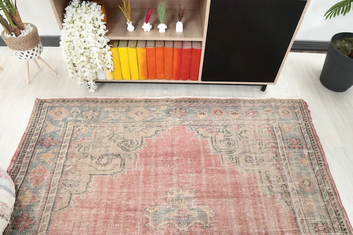 View from above, highlighting the rug's design and colors in a room setting