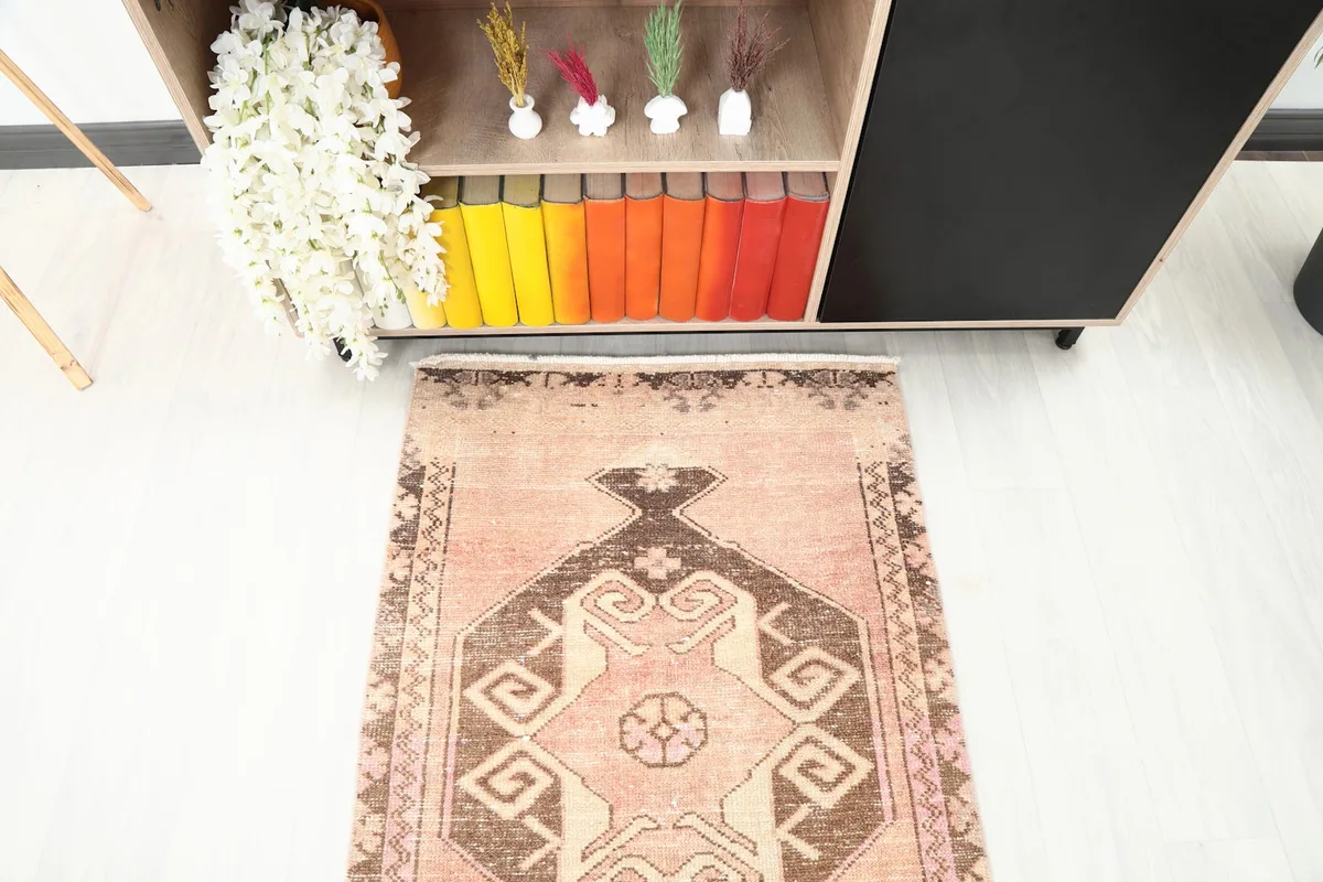 Top-down view of the main geometric motif at one end of the vintage Anatolian runner.