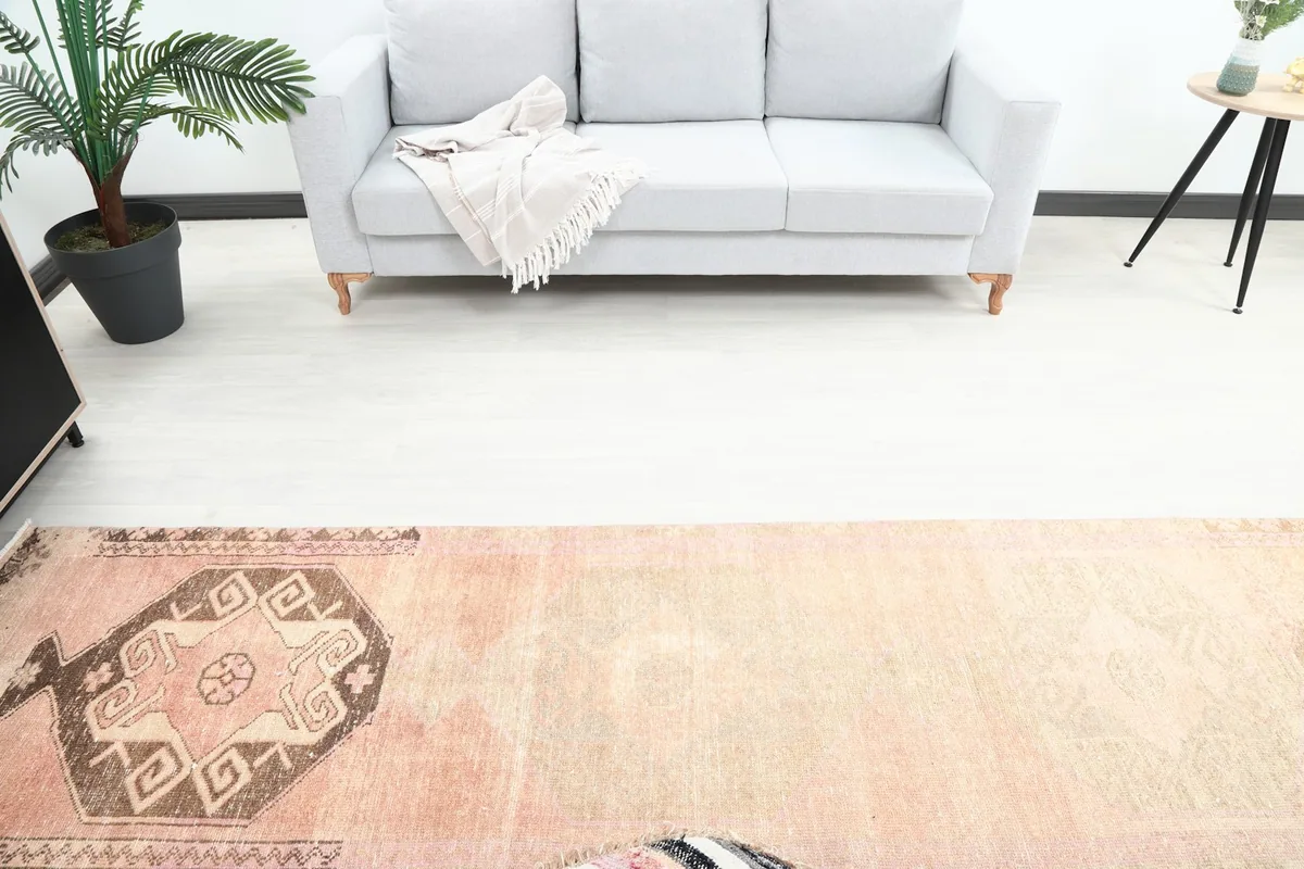 Overhead view of the runner rug in a room, capturing its full length and the surrounding furniture.