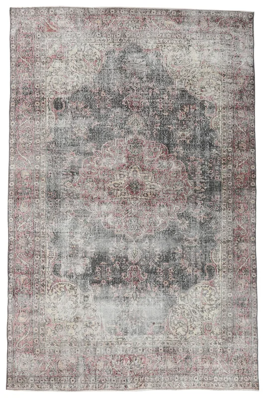 Full overhead view of the 6x10 vintage Anatolian area rug with a rose medallion on a charcoal field.