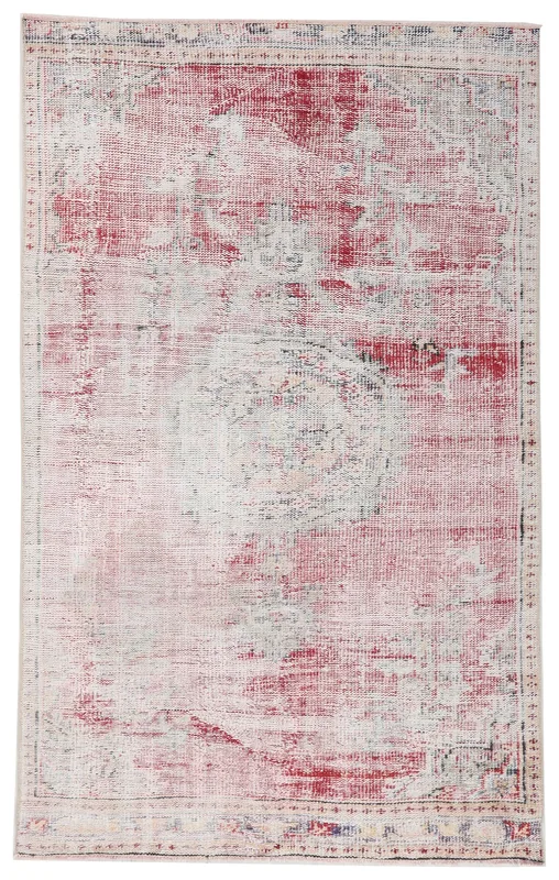 Full top view of the 4x7 rose and cream distressed vintage Anatolian rug on a white background.