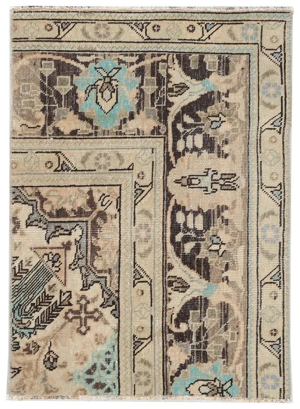 Full overhead view of the beige and brown vintage Anatolian area rug