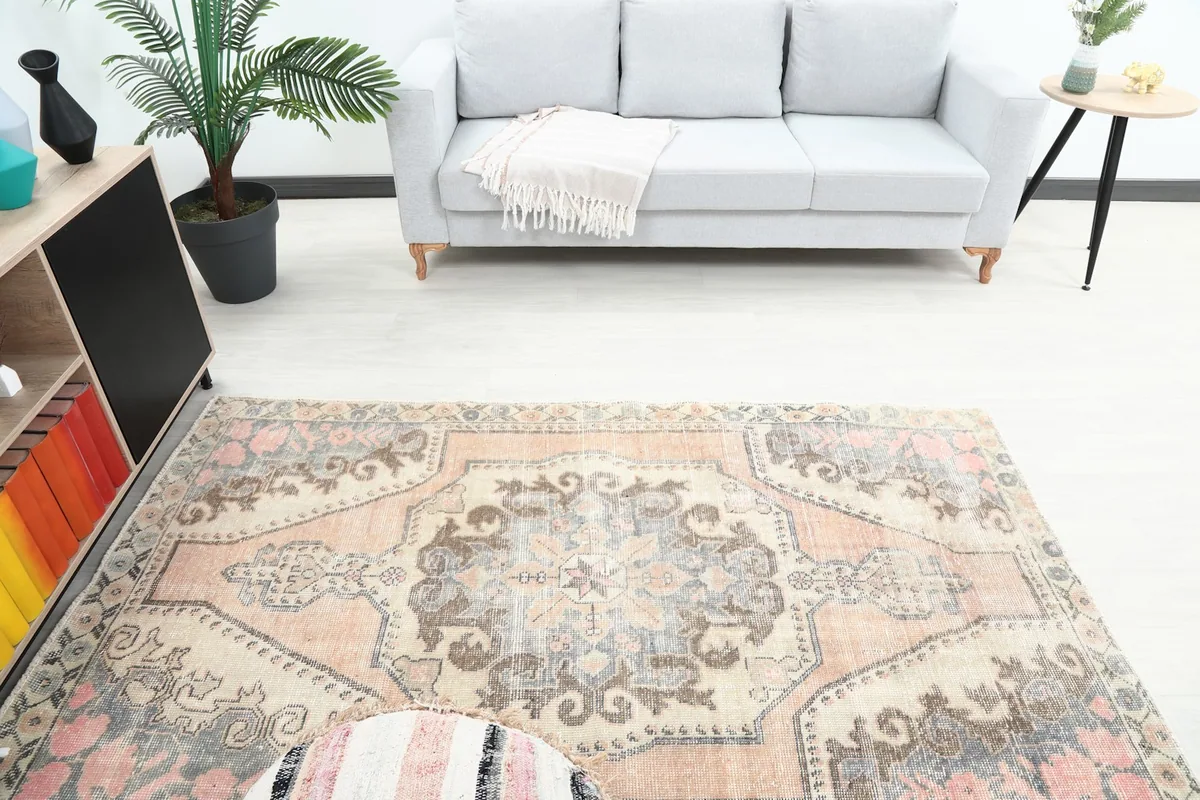 Overhead view of the rug in a room, capturing its full design and integration with decor.