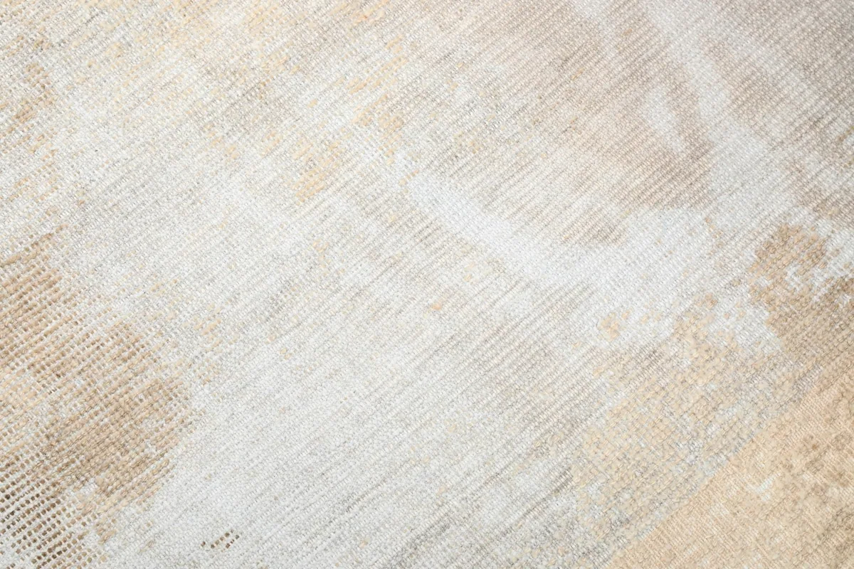 Close-up of the low wool pile, showing the texture and the hand-knotted construction.