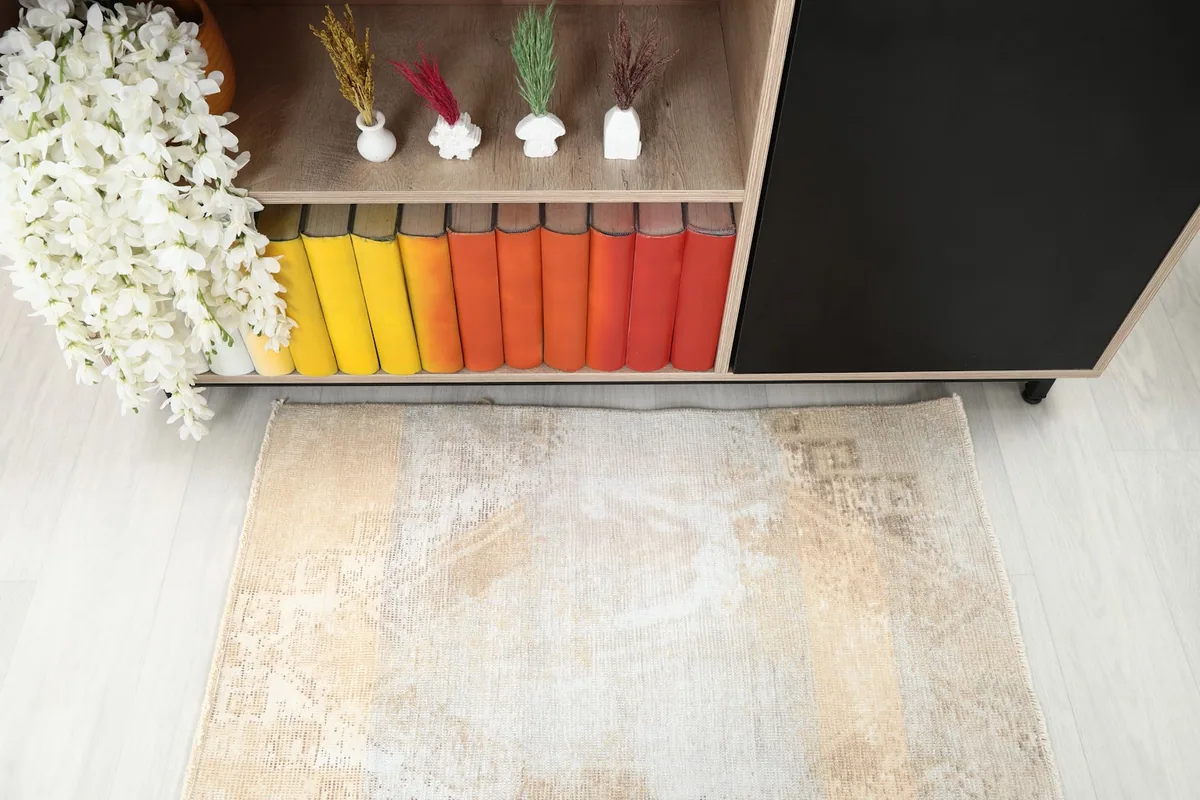 Overhead shot of the rug on a light floor, highlighting its placement in the room.