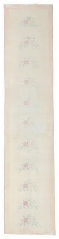 Full top view of the 2x11 vintage cream runner rug with rose floral motifs on a white background.
