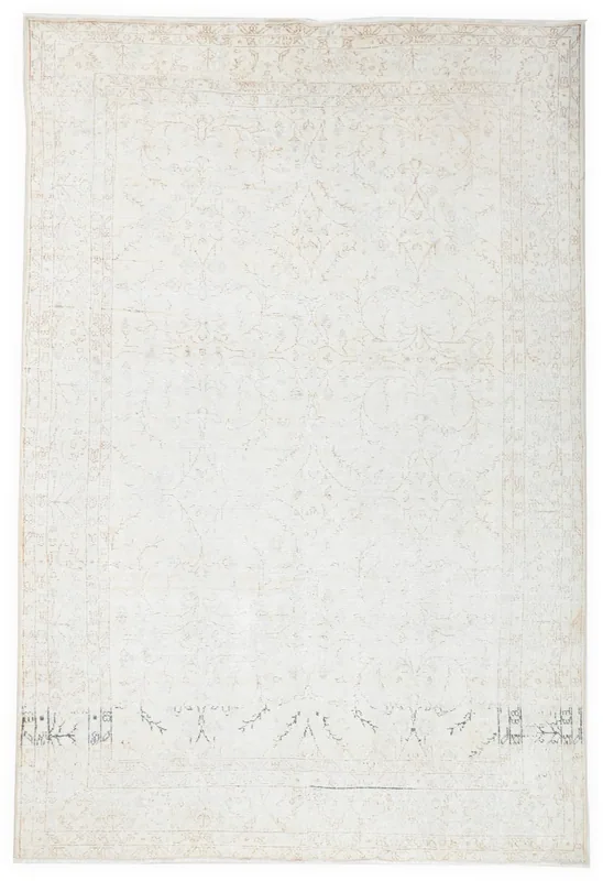 Full overhead view of the 6x10 ivory floral vintage Anatolian rug on a white background.
