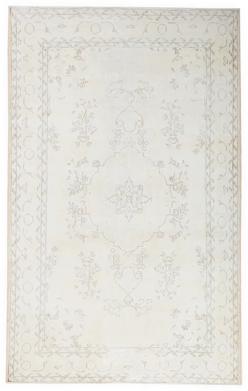 Full top view of the 6x10 vintage Anatolian rug with an ivory field and tan patterns