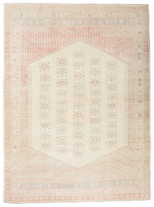 Full top view of the vintage Anatolian rug with an ivory field and rose border